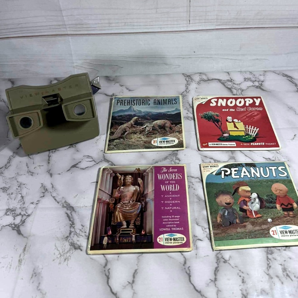 Vintage View-Master with 4 Reels:‎ Prehistoric Animals, Snoopy, Seven Wonders